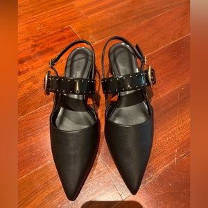 Brand new never worn Charles & Keith black Sepphe grommet slingback heels pumps